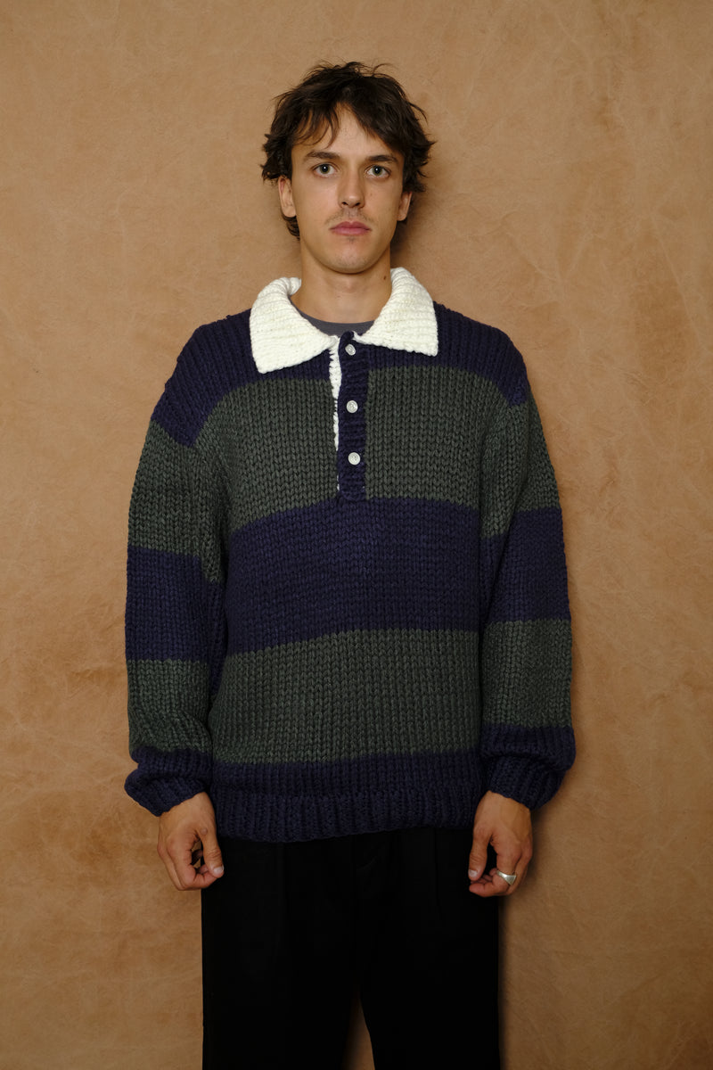 hand knitting rugby in navy