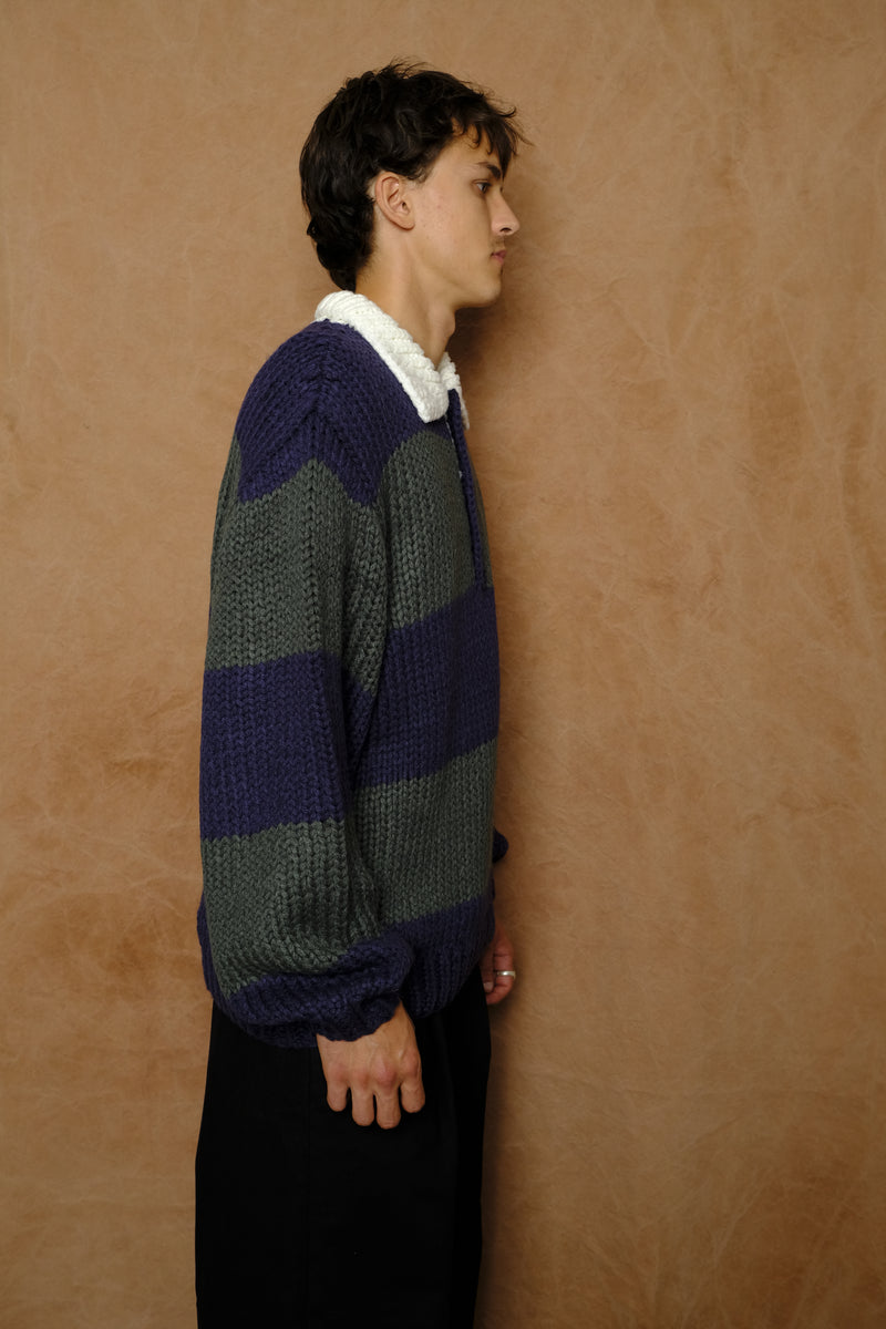 hand knitting rugby in navy