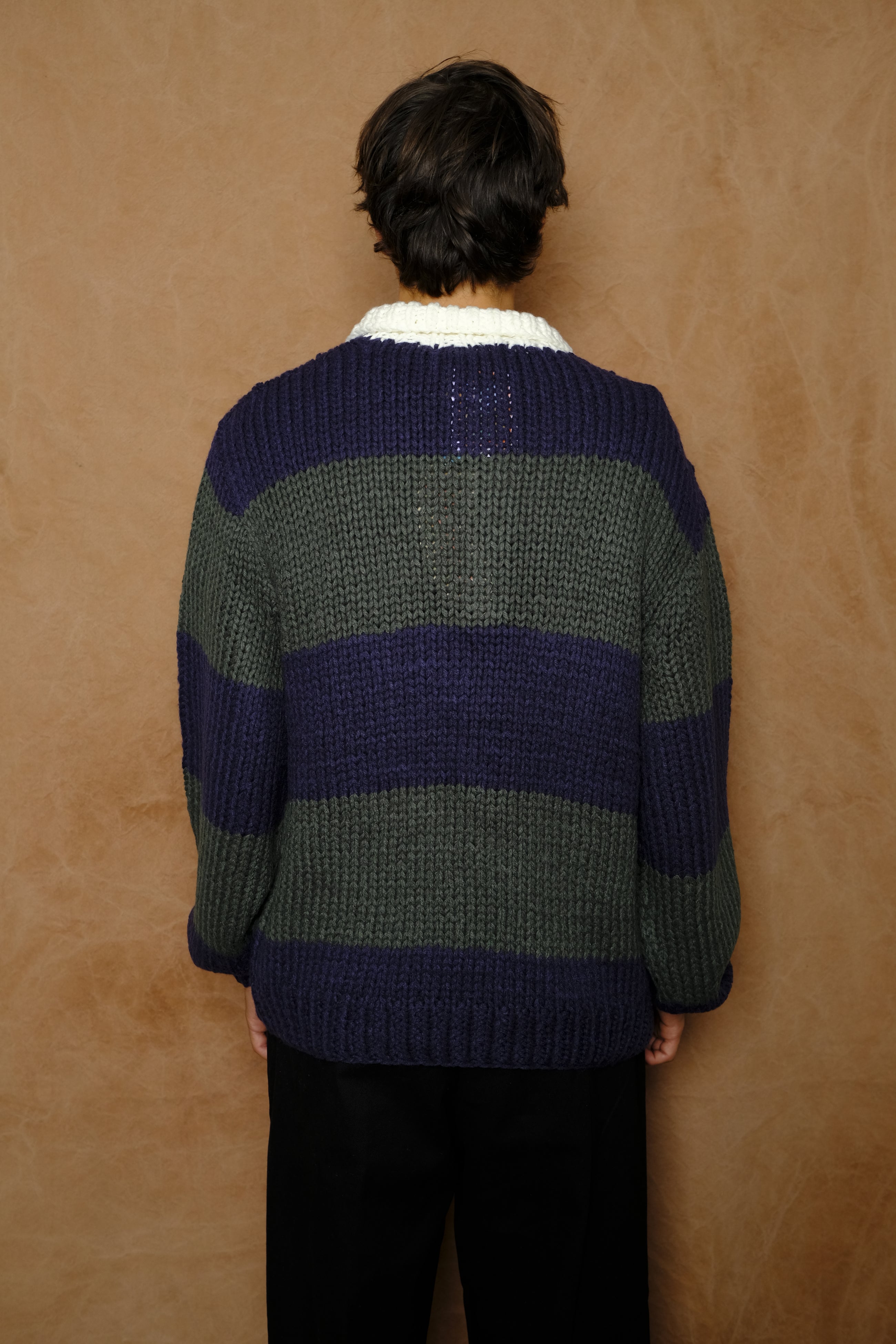 hand knitting rugby in navy