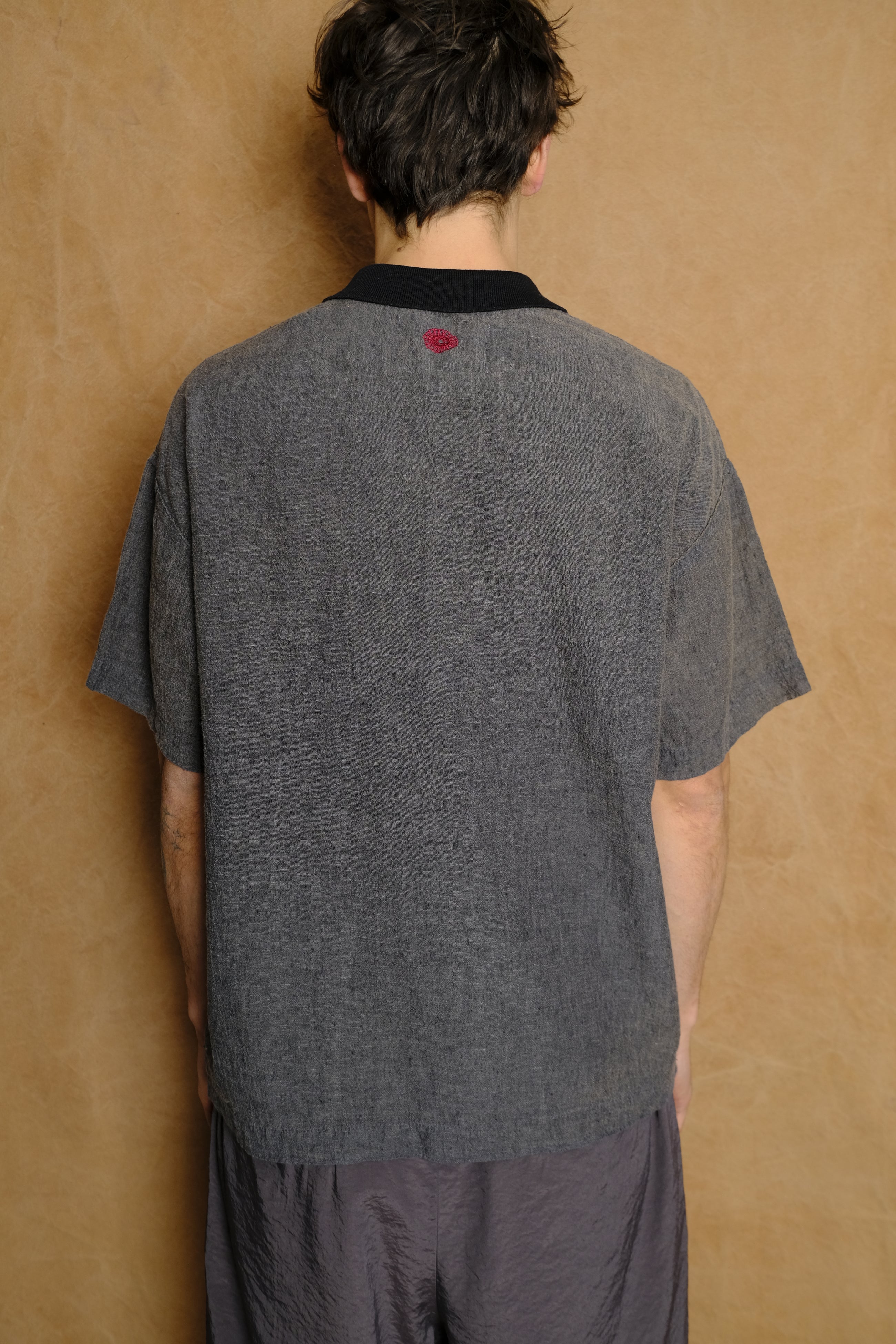 praise polo in washed black