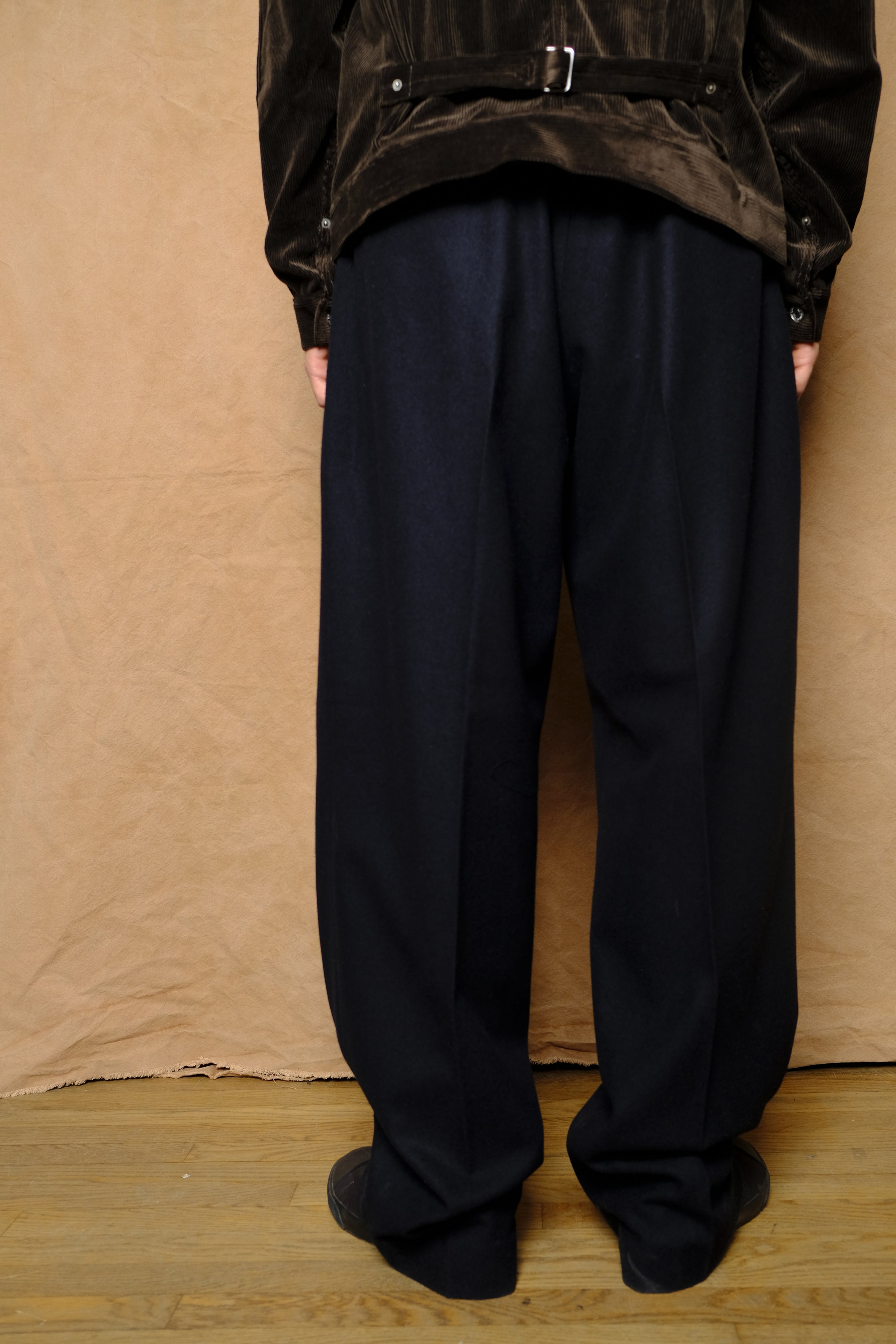 in tuck trousers in navy powder melton wool