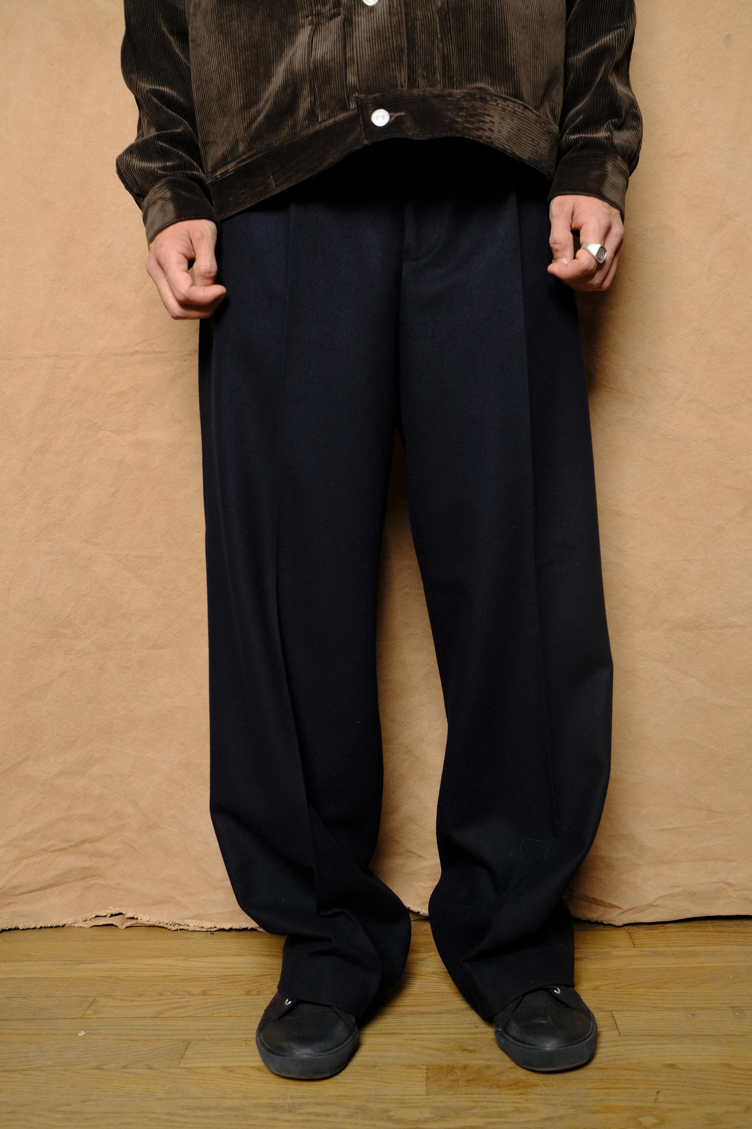in tuck trousers in navy powder melton wool