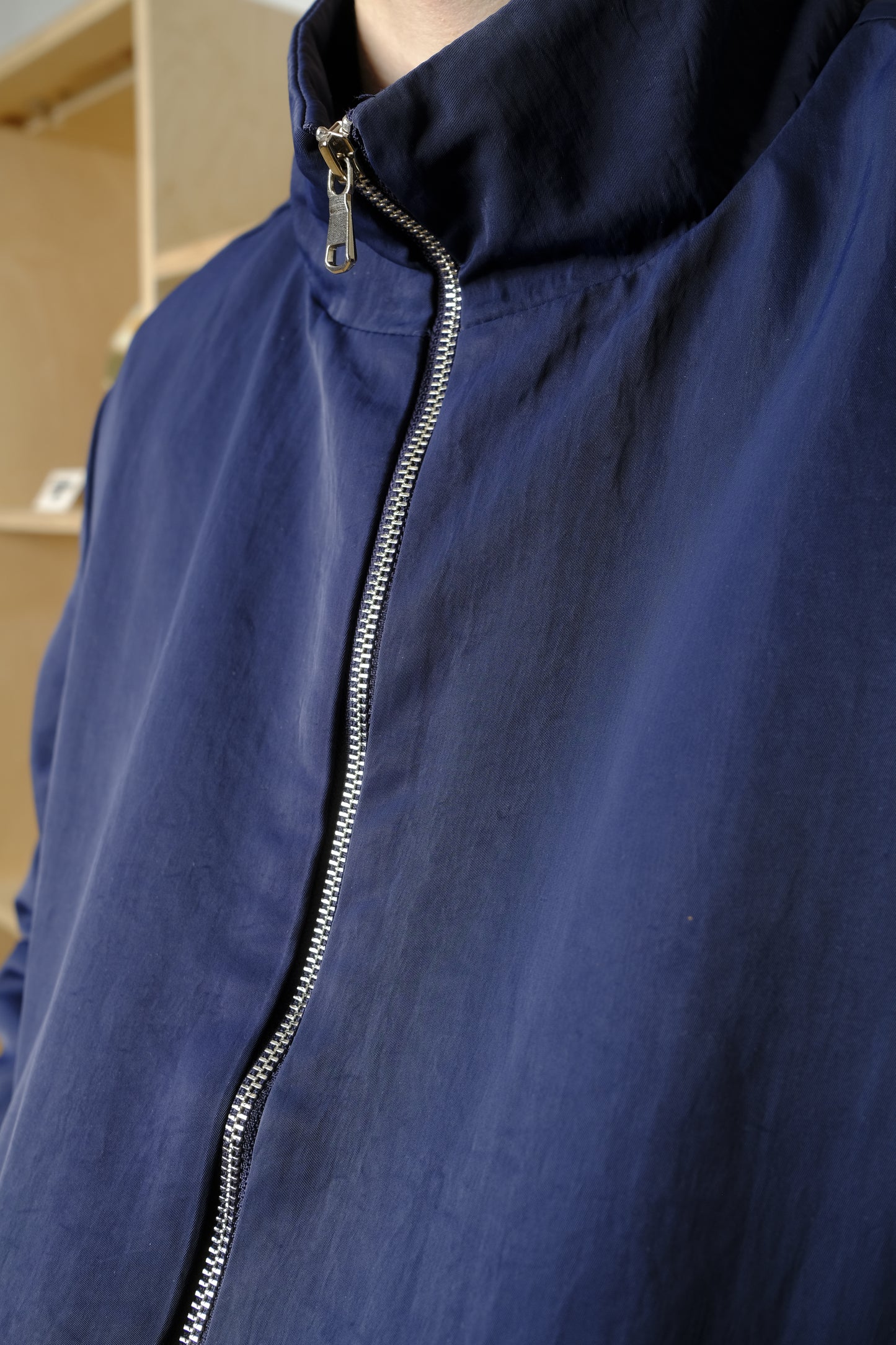 the zip up jacket in navy