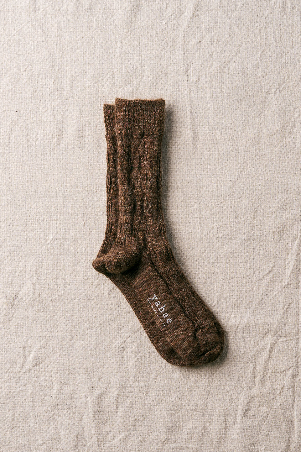 alpaca cable pattern socks in brown