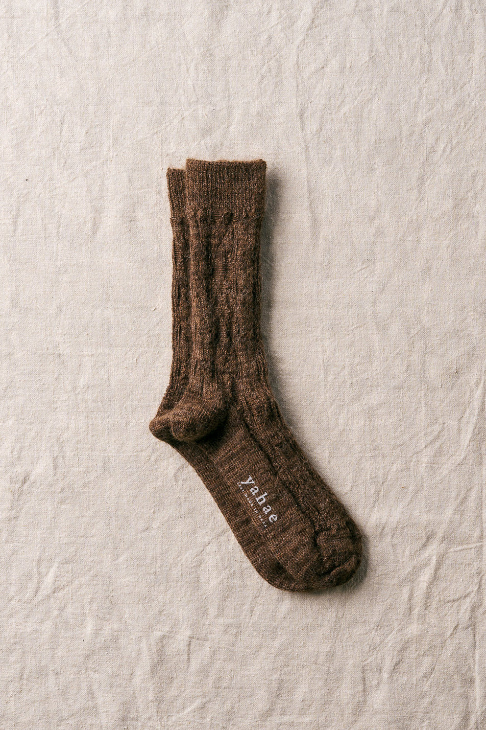 alpaca cable pattern socks in dark brown