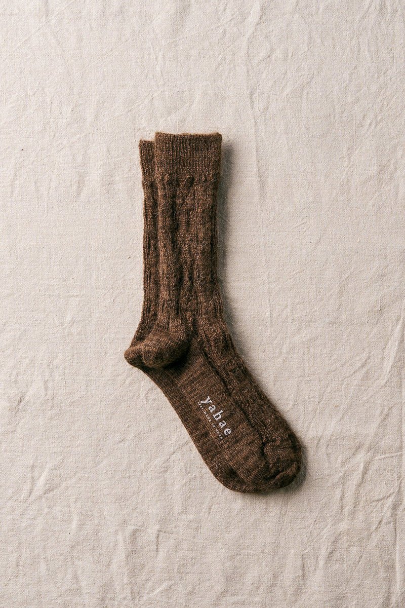 alpaca cable pattern socks in dark brown