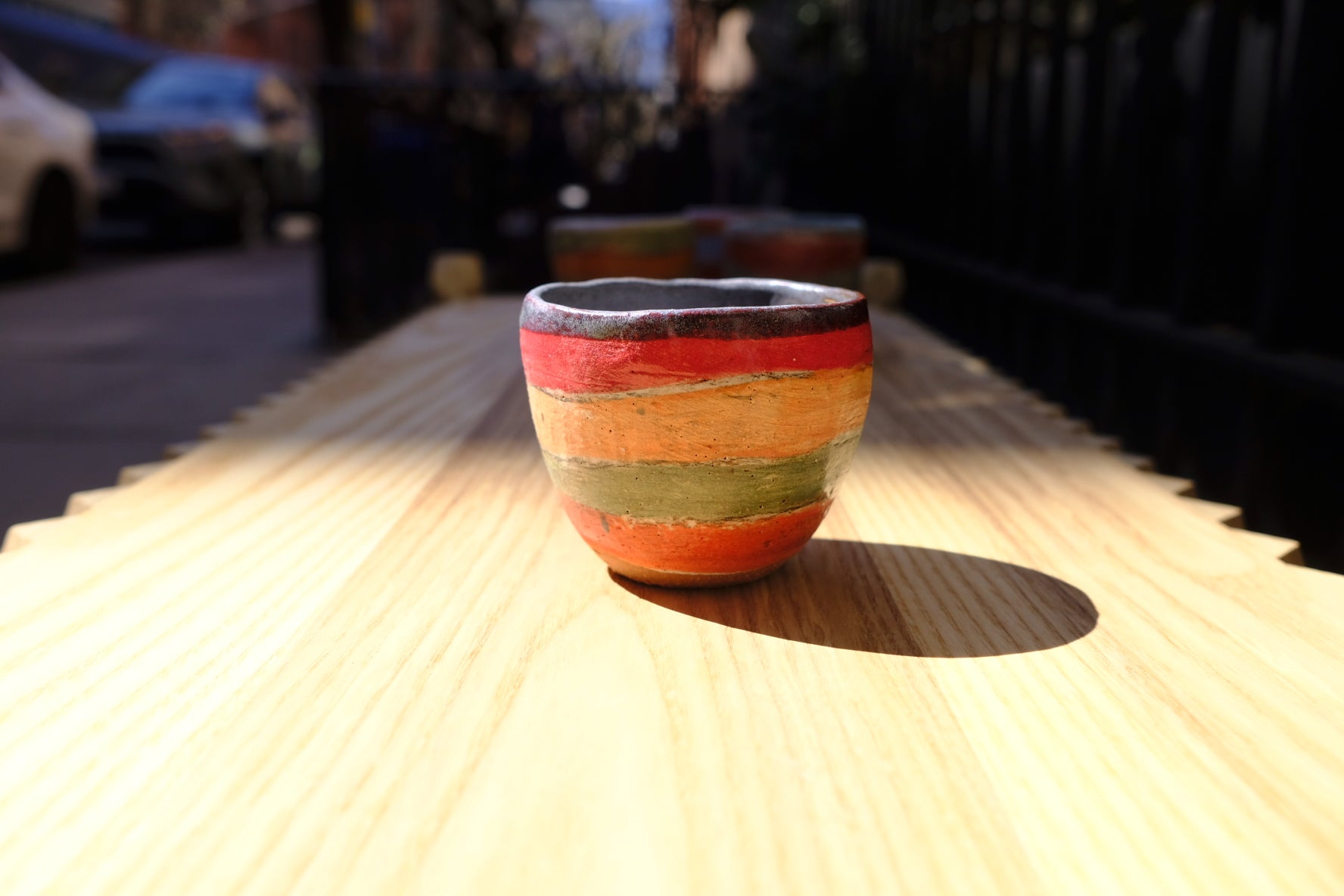 red / yellow / green striped cup