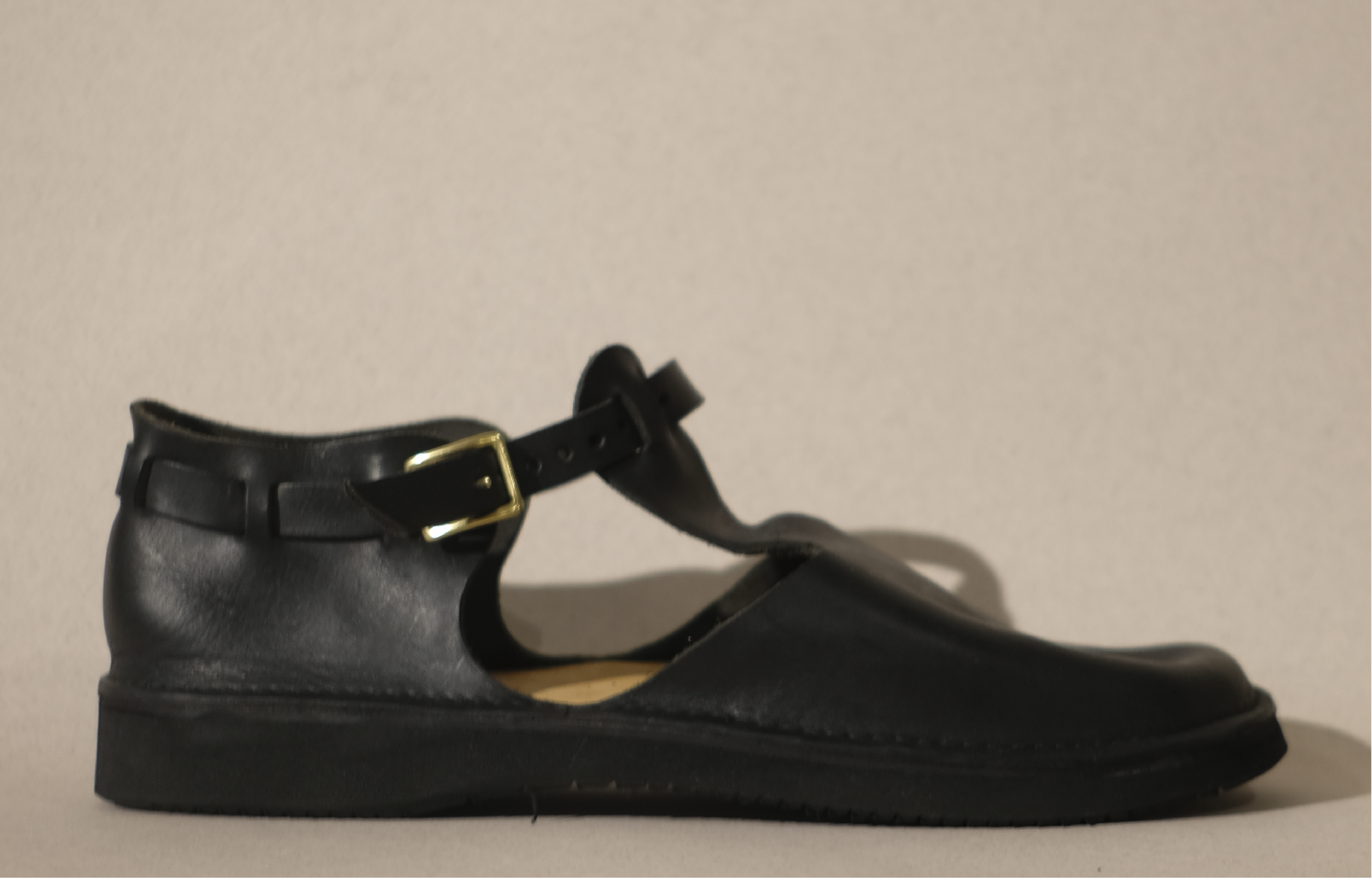 t strap in black