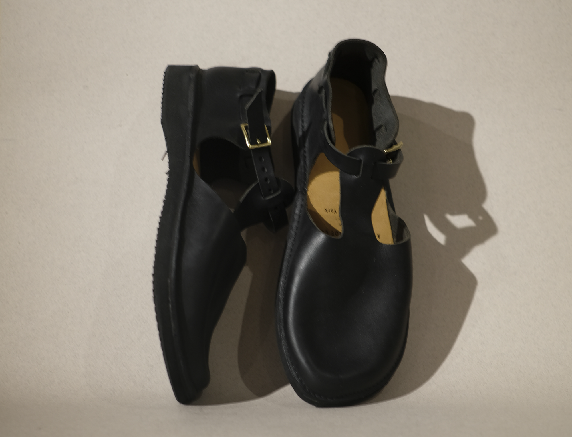 t strap in black