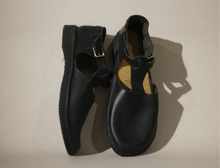 t strap in black