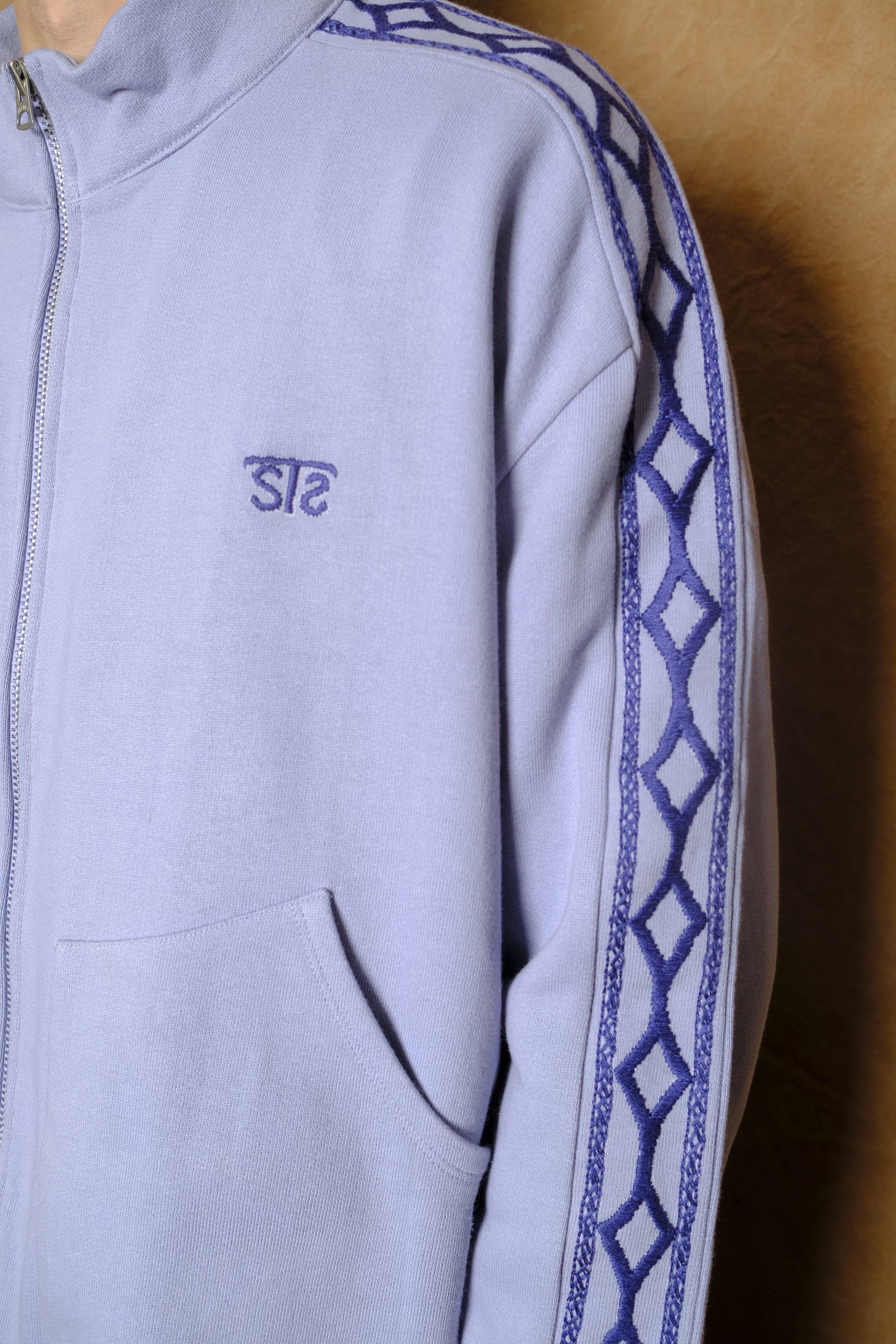 hand embroidered track jacket in light blue