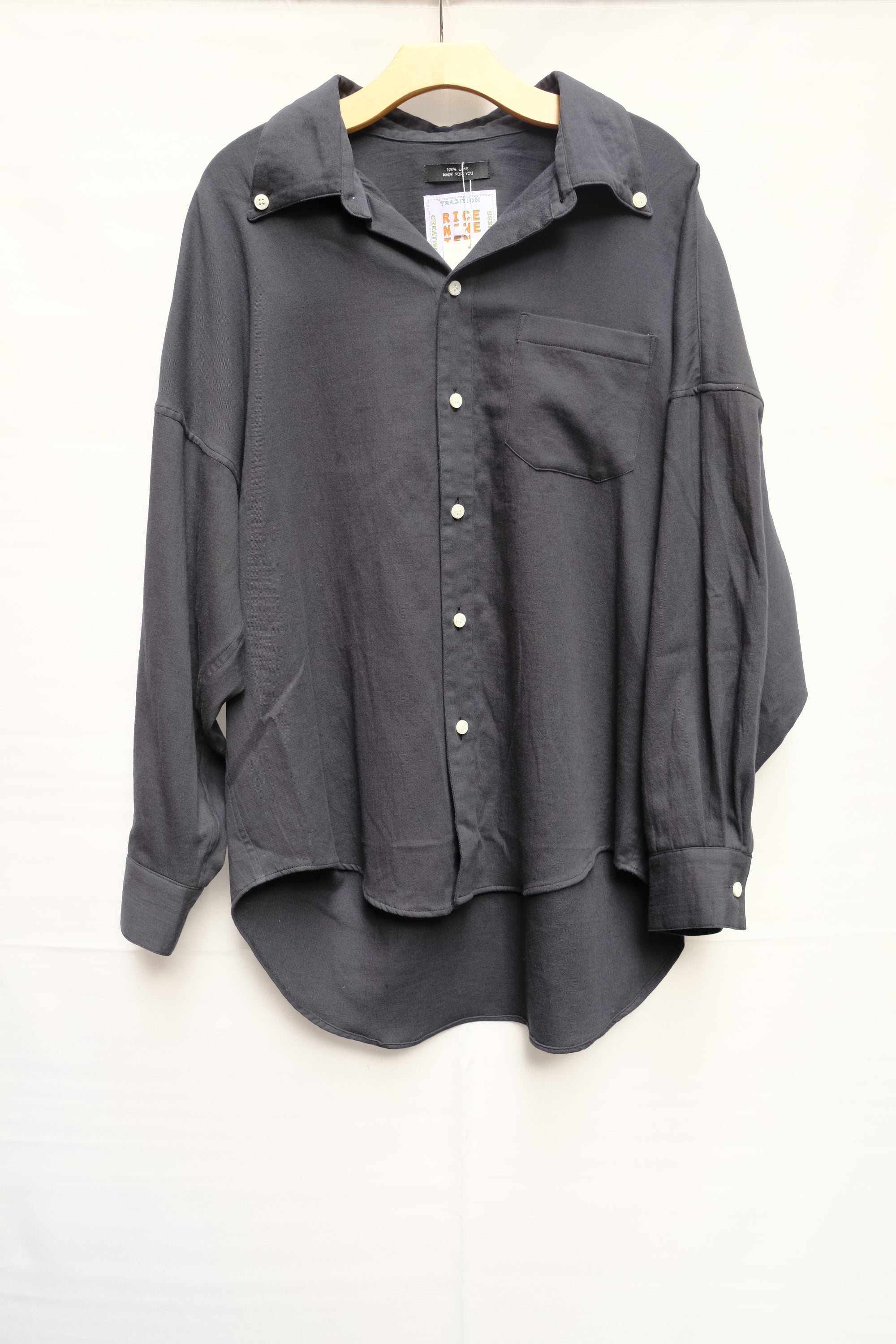 black dropped open button down shirt