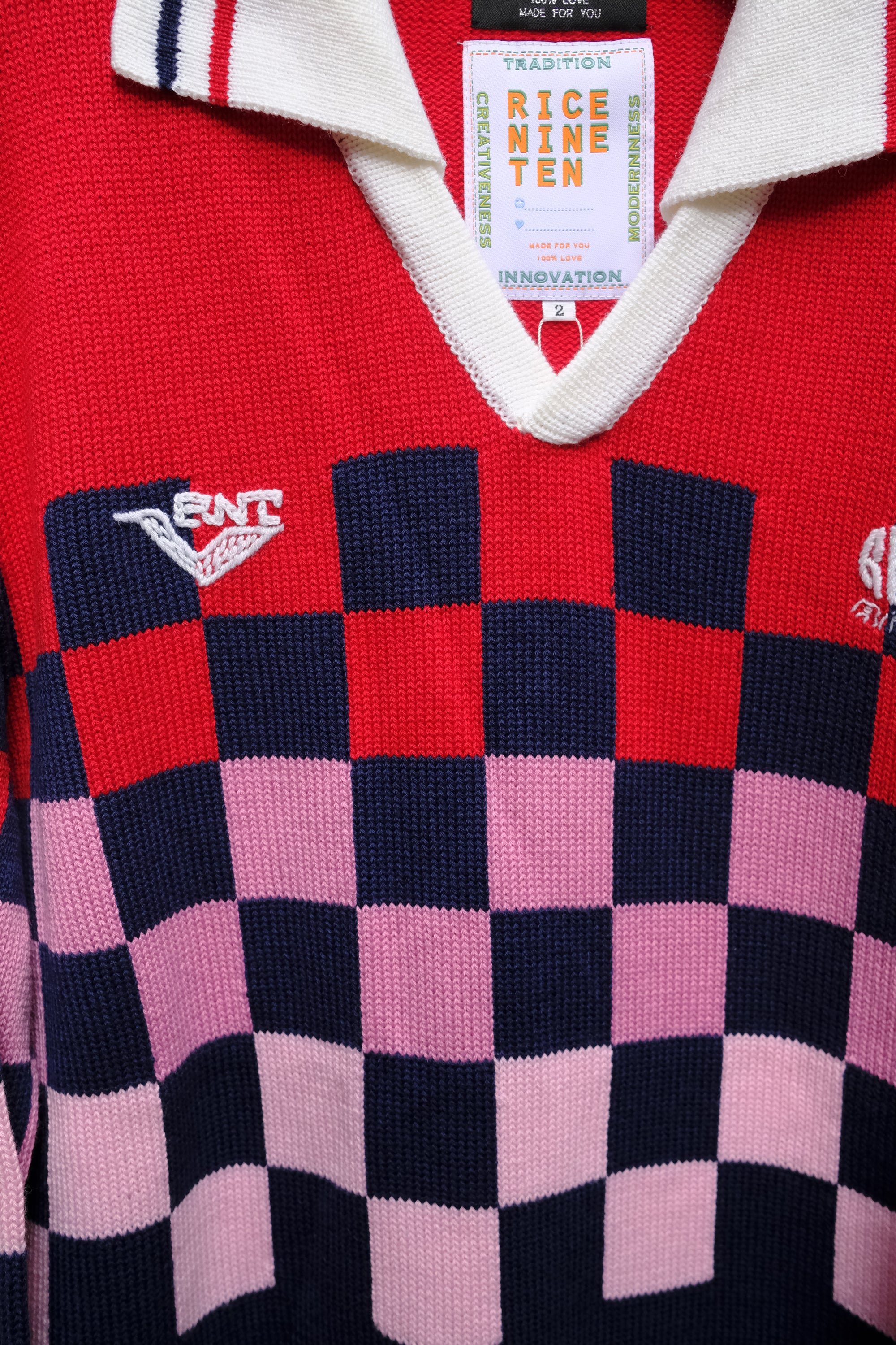 blue / pink / red checkered knit soccer jersey