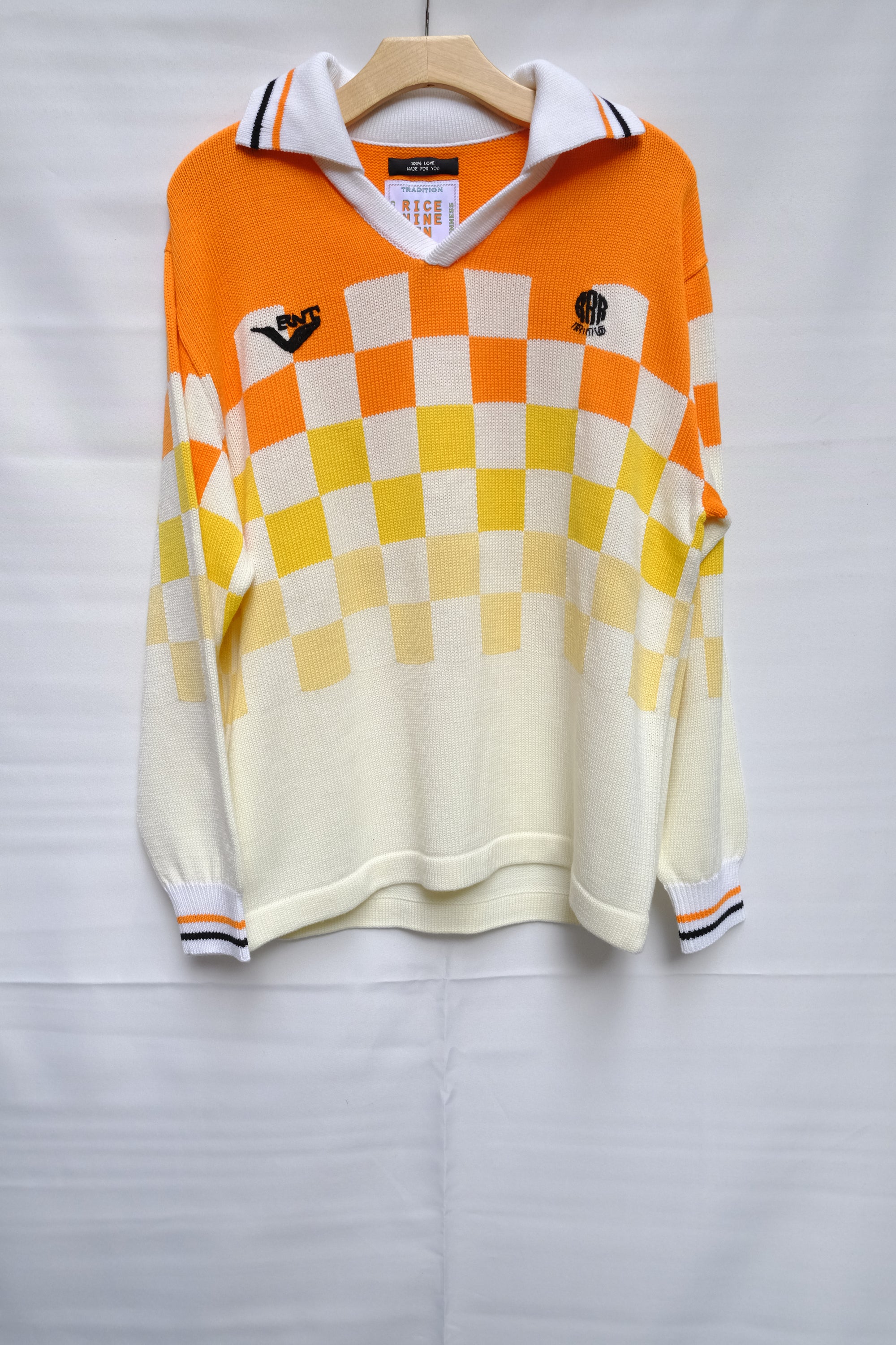 white / orange / yellow checkered knit soccer jersey