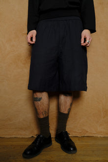 wide shorts in hand loomed black cotton