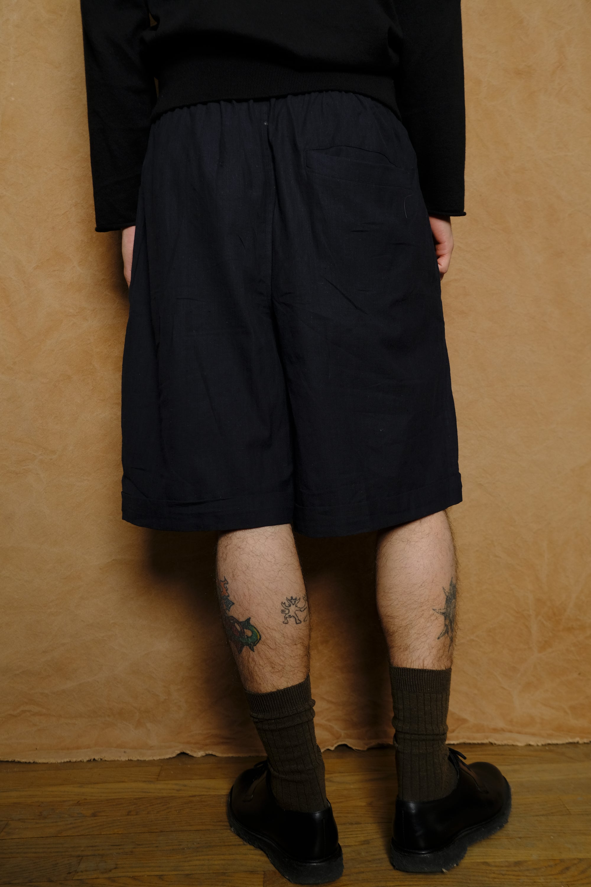 wide shorts in hand loomed black cotton