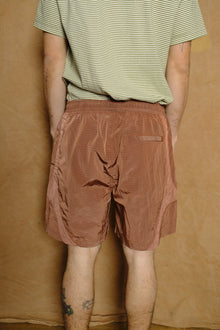 equis short in pomegranate/ruby