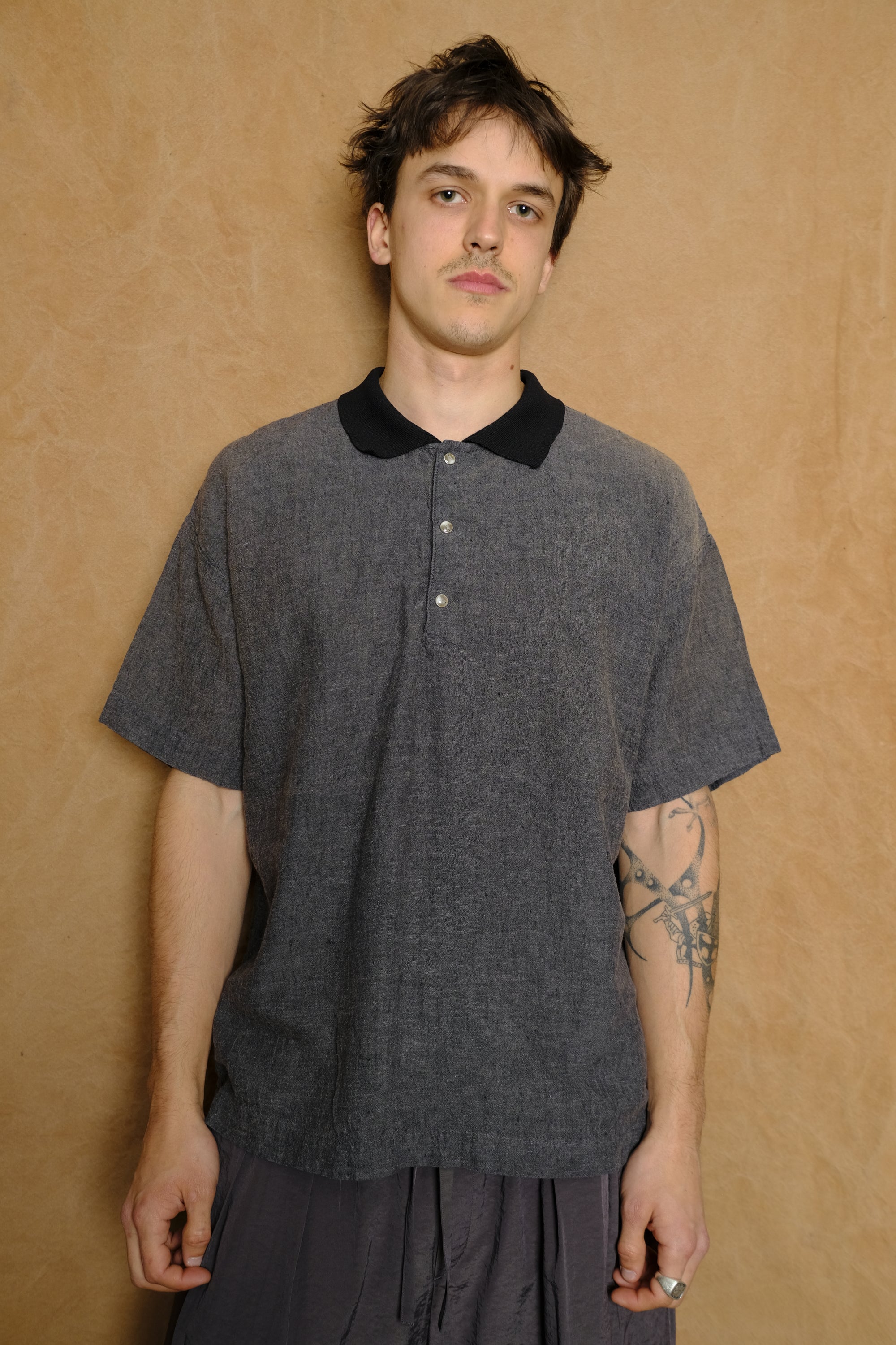 praise polo in washed black