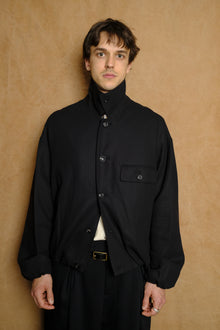 bubble hem blouson in charcoal grey