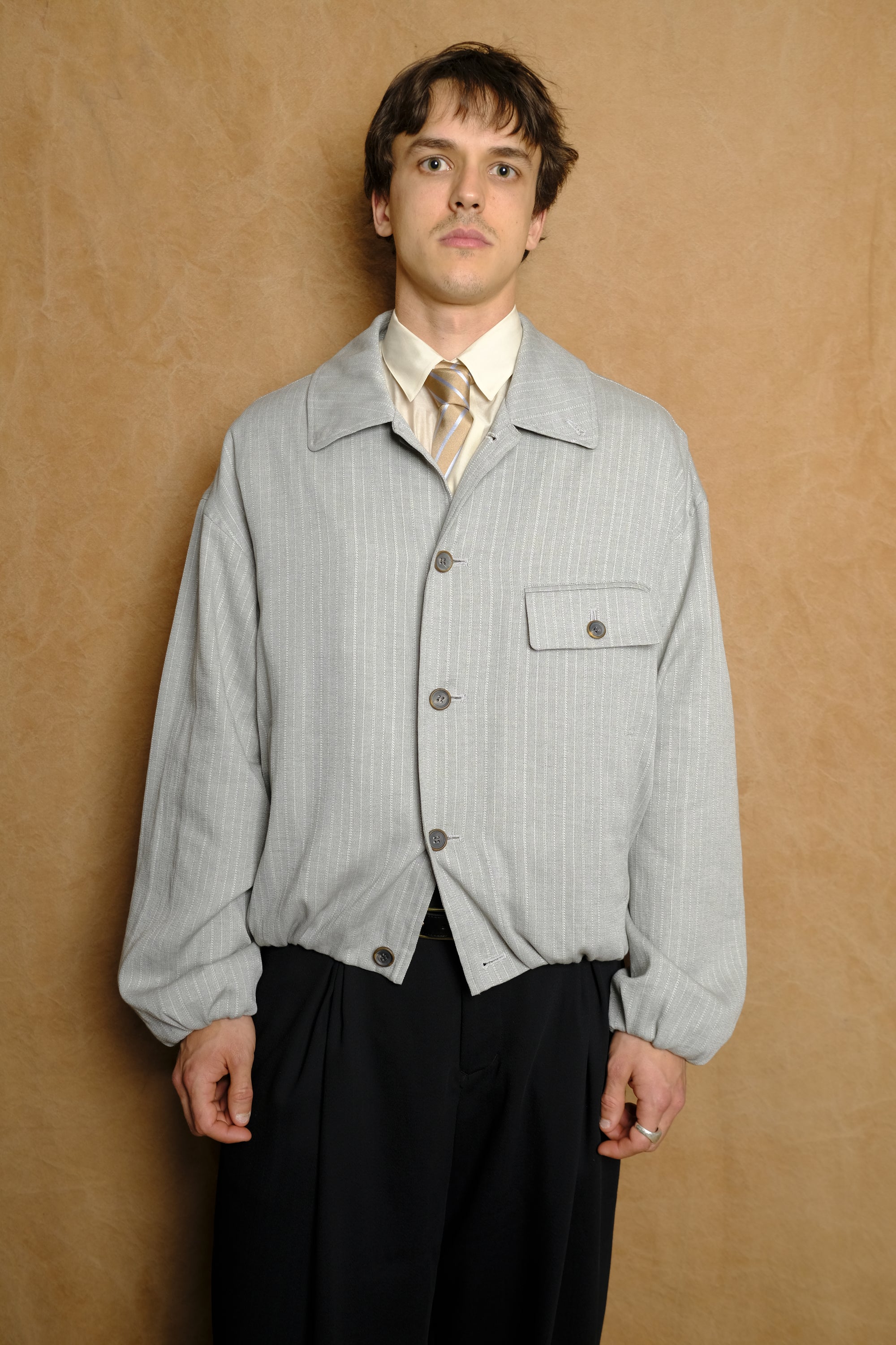 bubble hem blouson in light grey