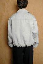 bubble hem blouson in light grey