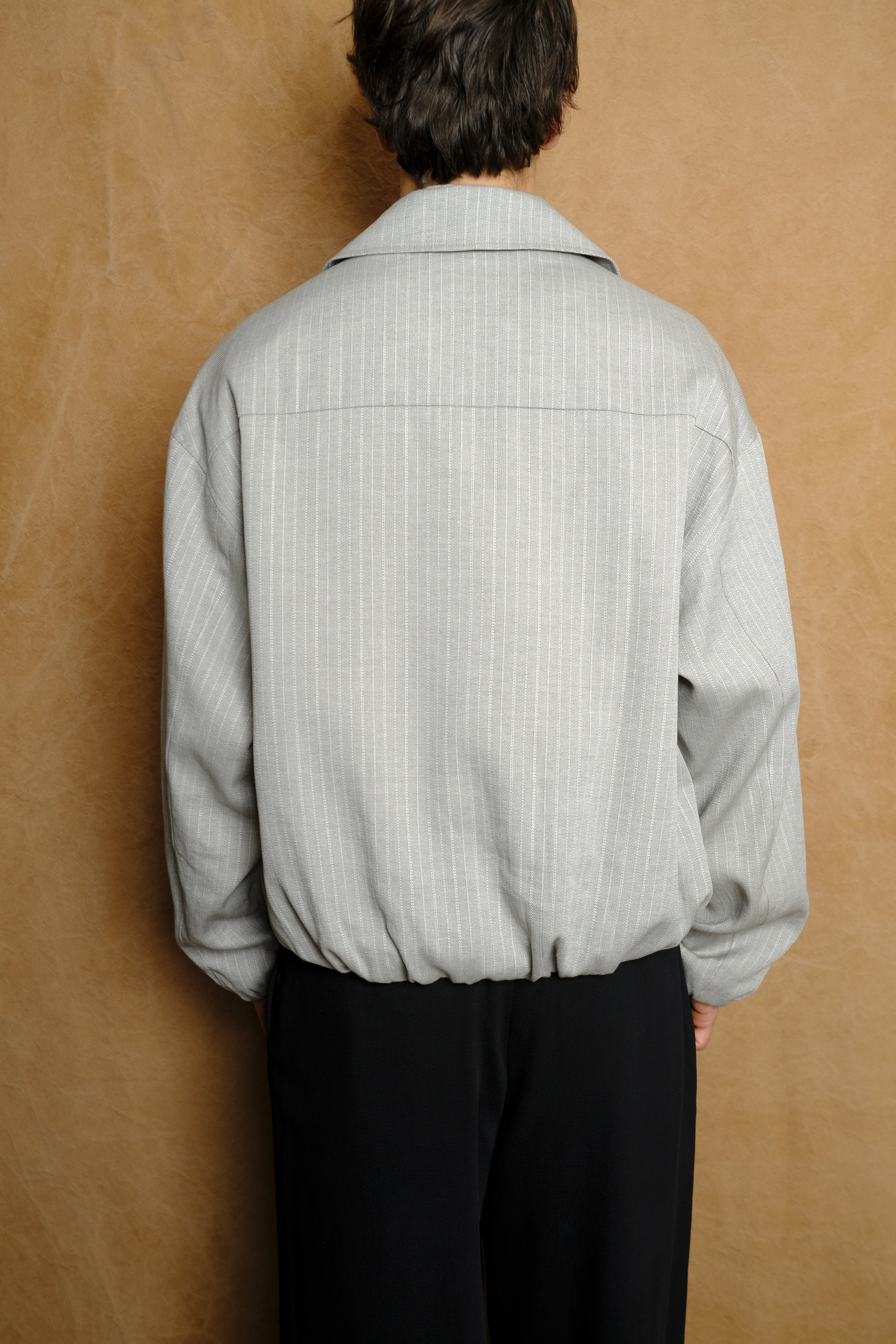 bubble hem blouson in light grey
