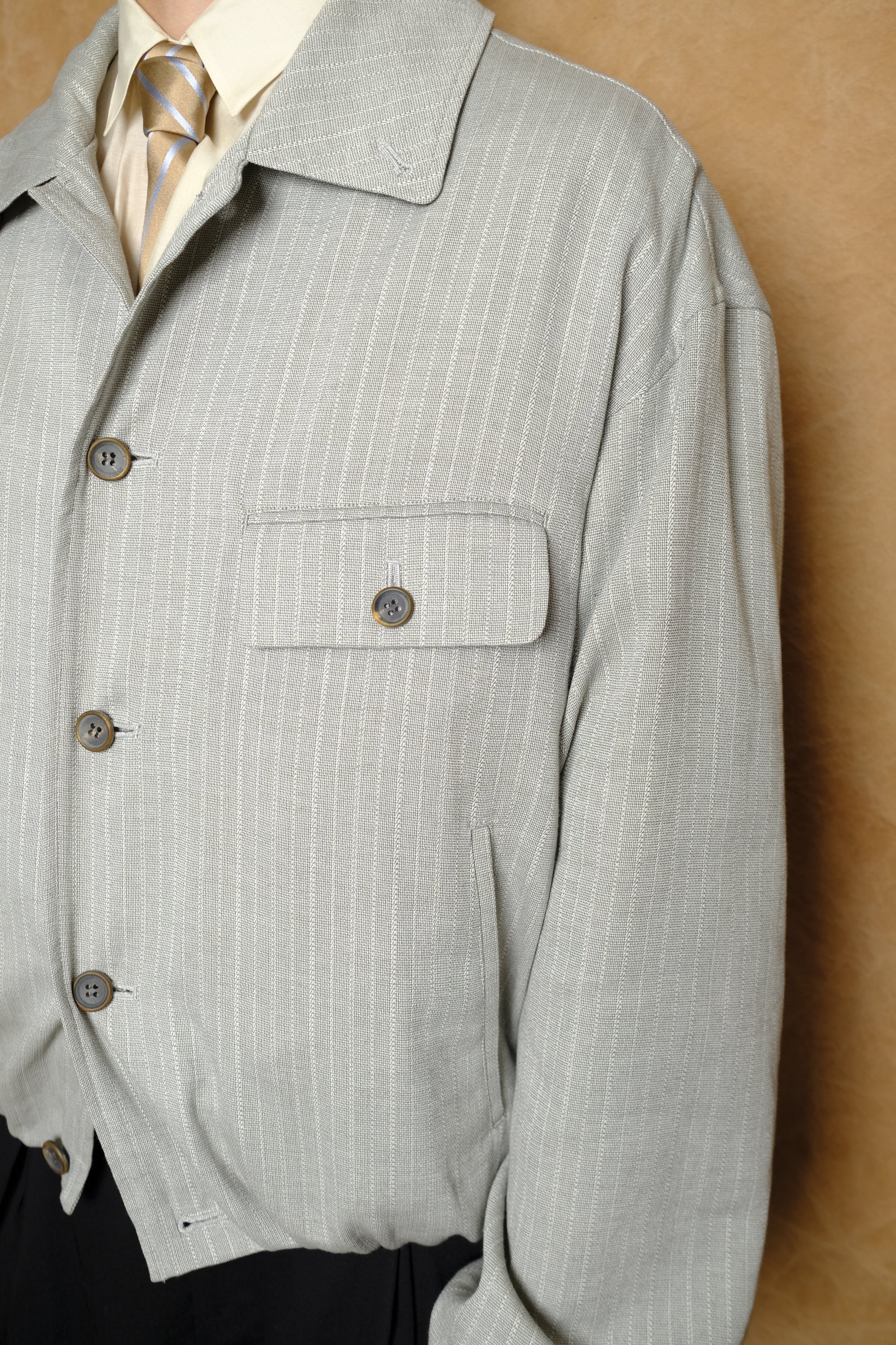 bubble hem blouson in light grey