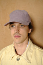 cap in mauve
