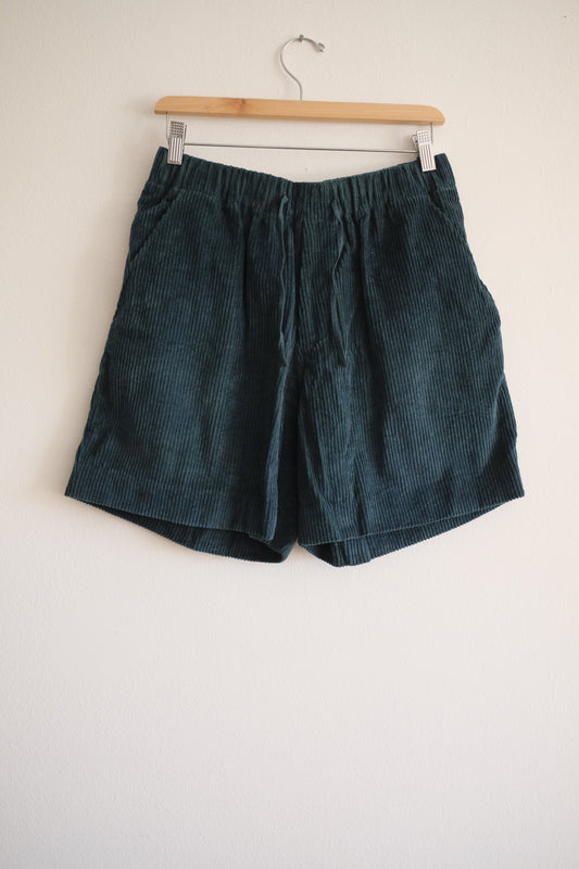 bottle green shorts