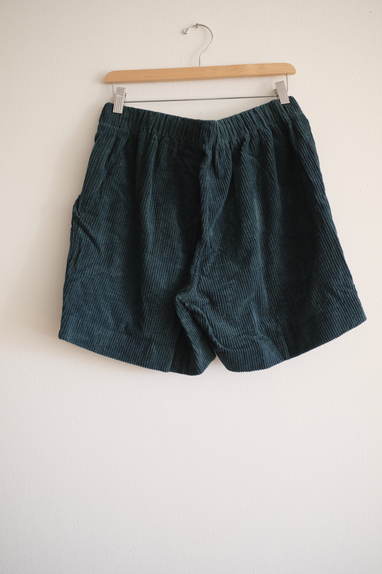 bottle green shorts