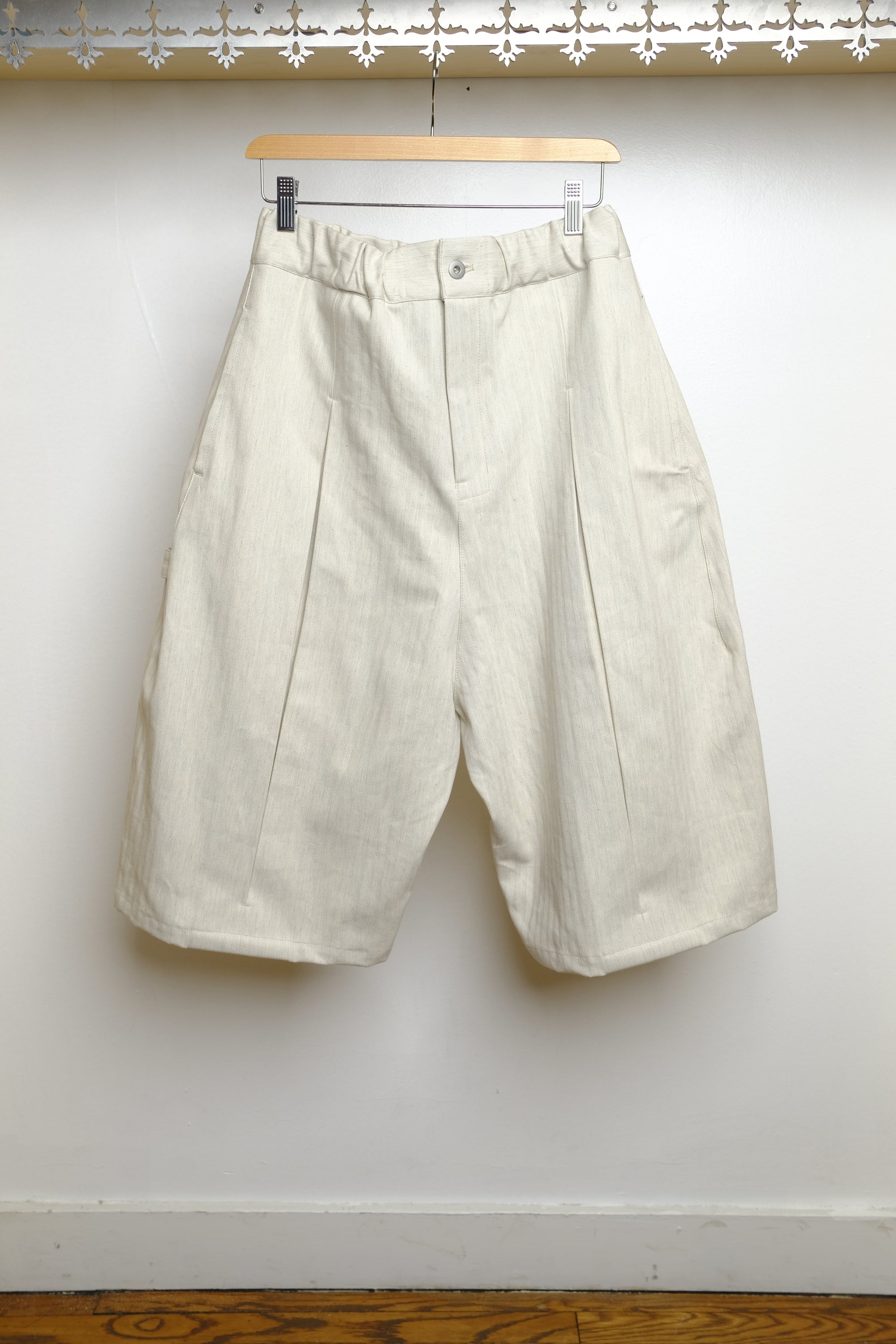 beige herringbone box pleat shorts