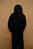 bouclé sweater in black