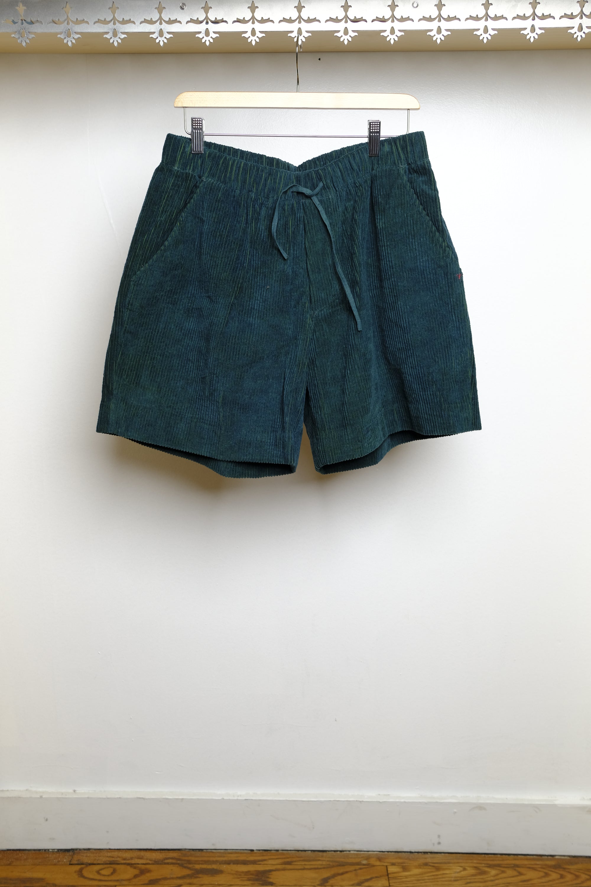bottle green shorts