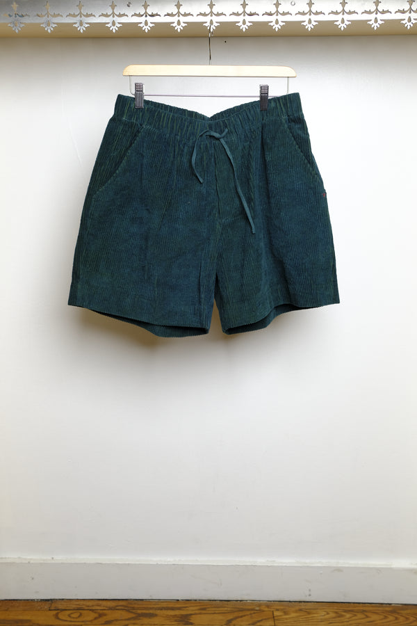 bottle green shorts