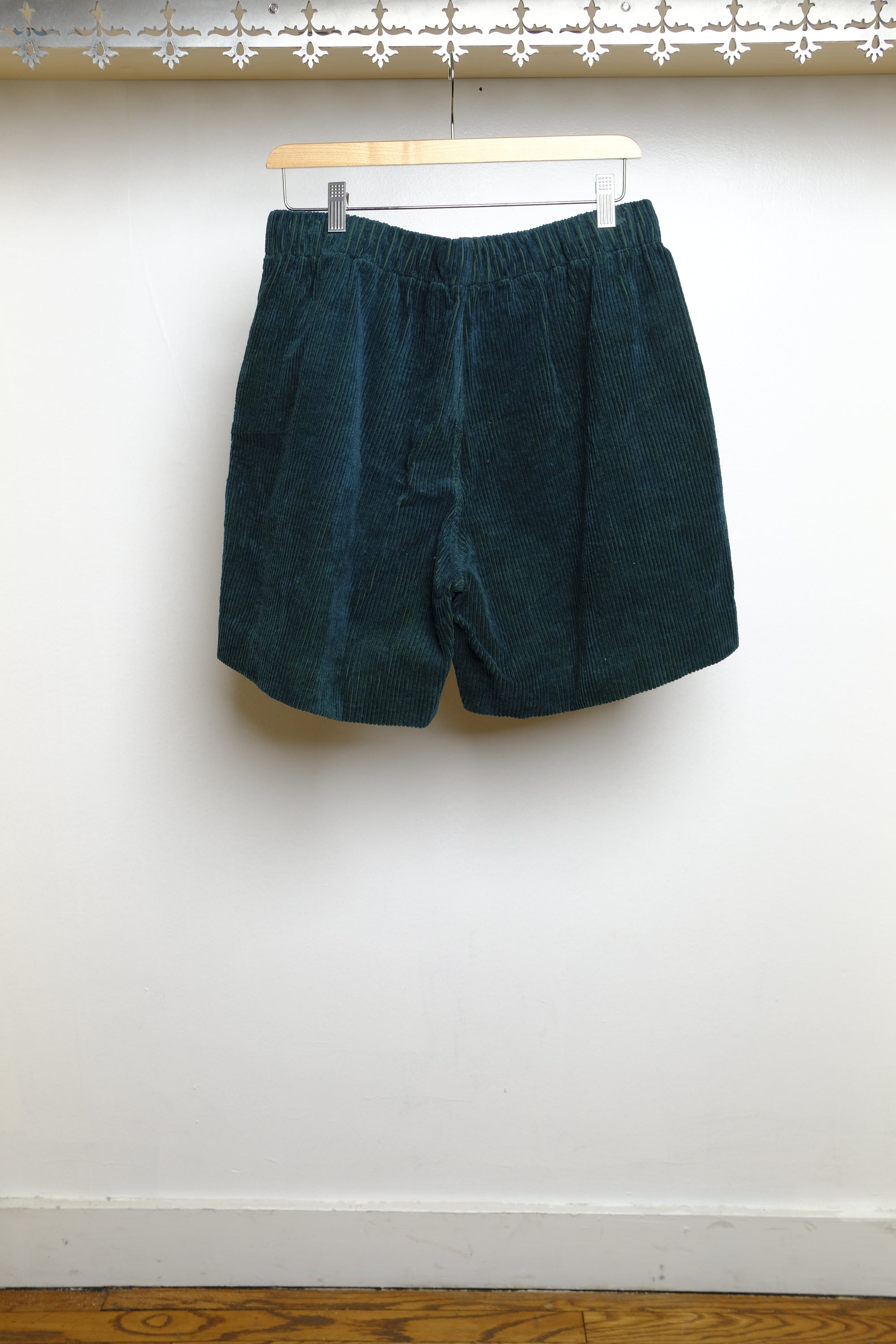bottle green shorts