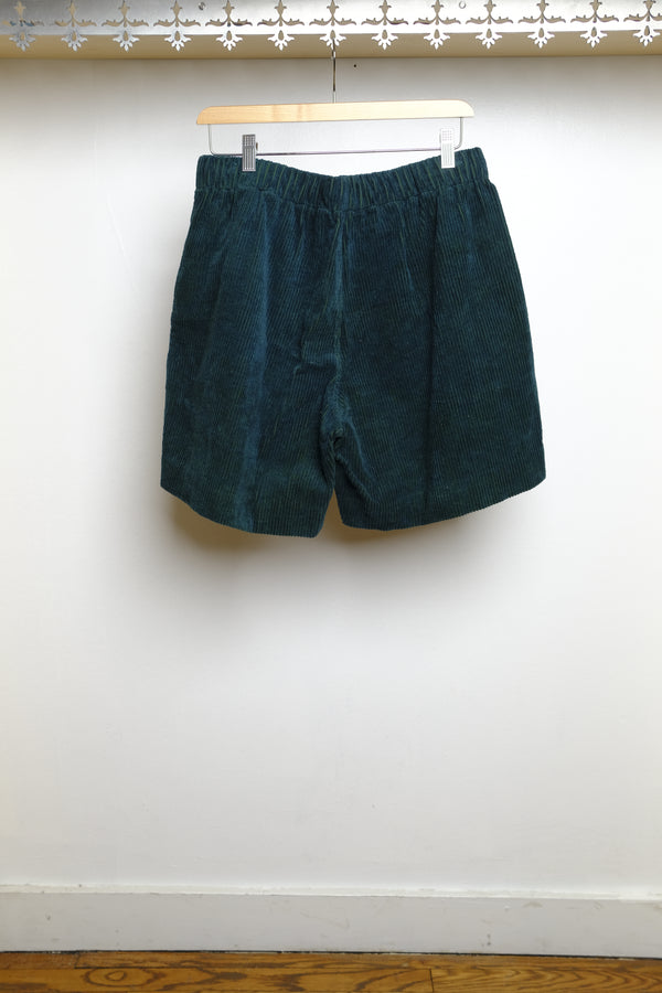 bottle green shorts