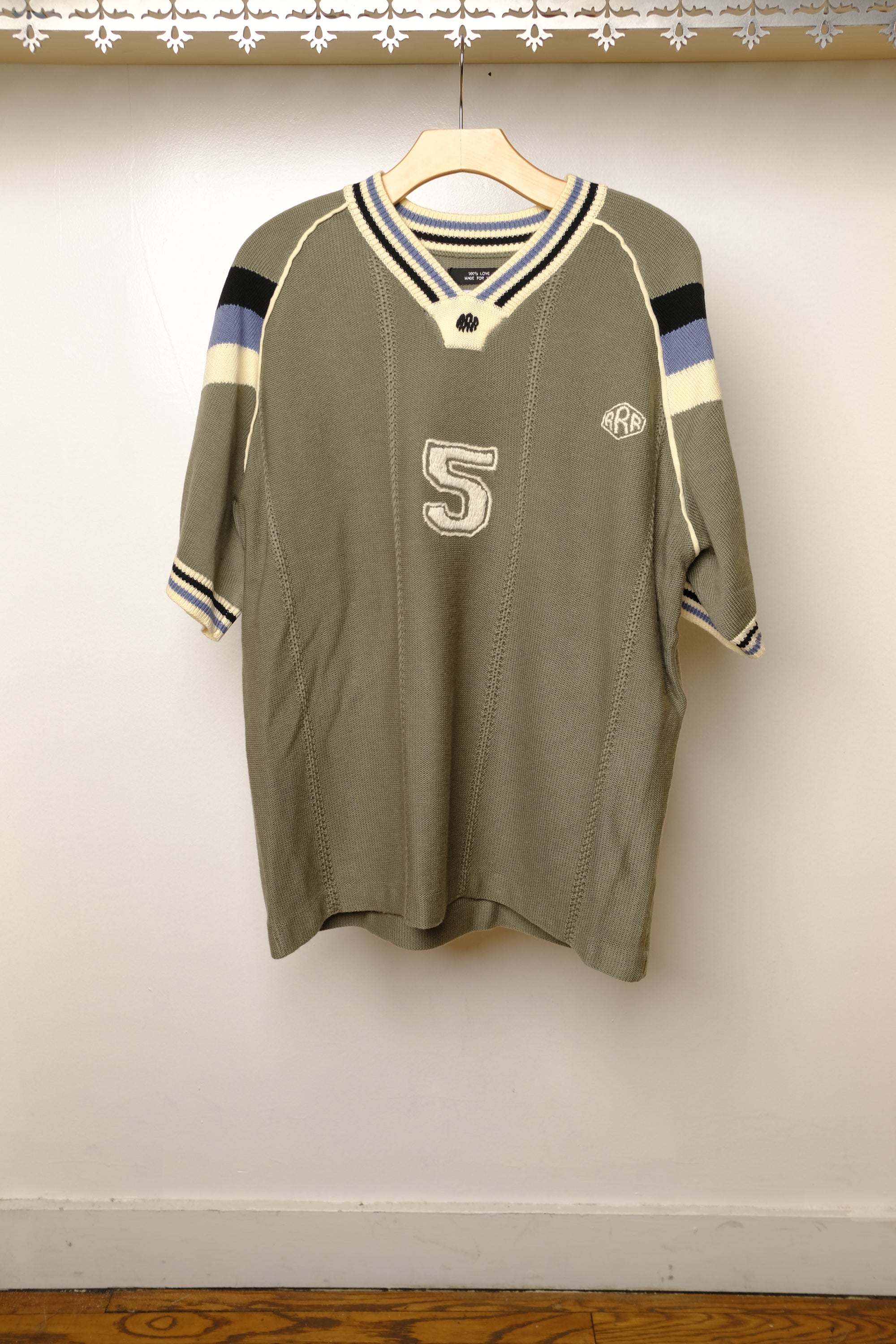 knitting game shirt in moss green