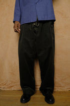 mika in green corduroy