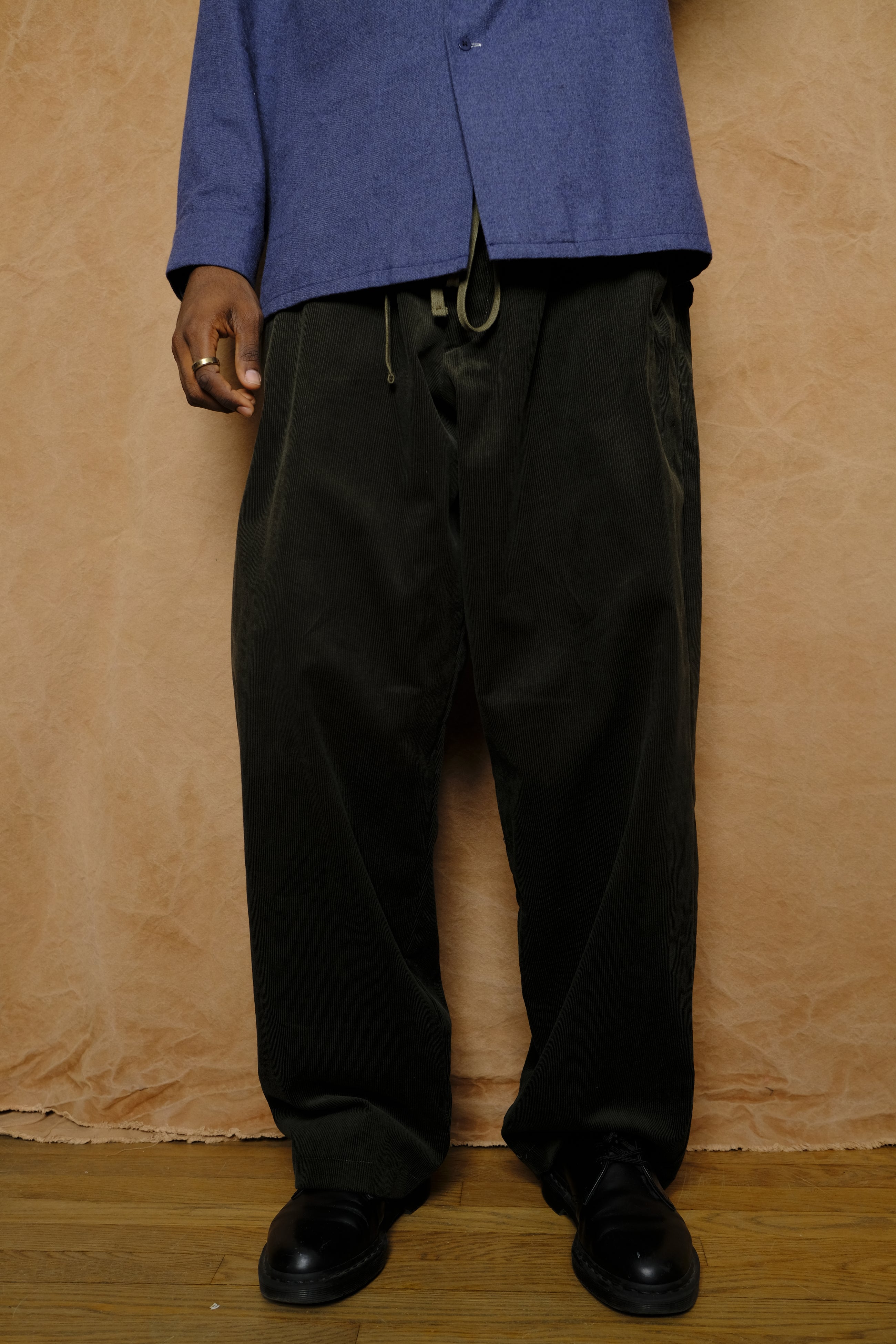 mika in green corduroy