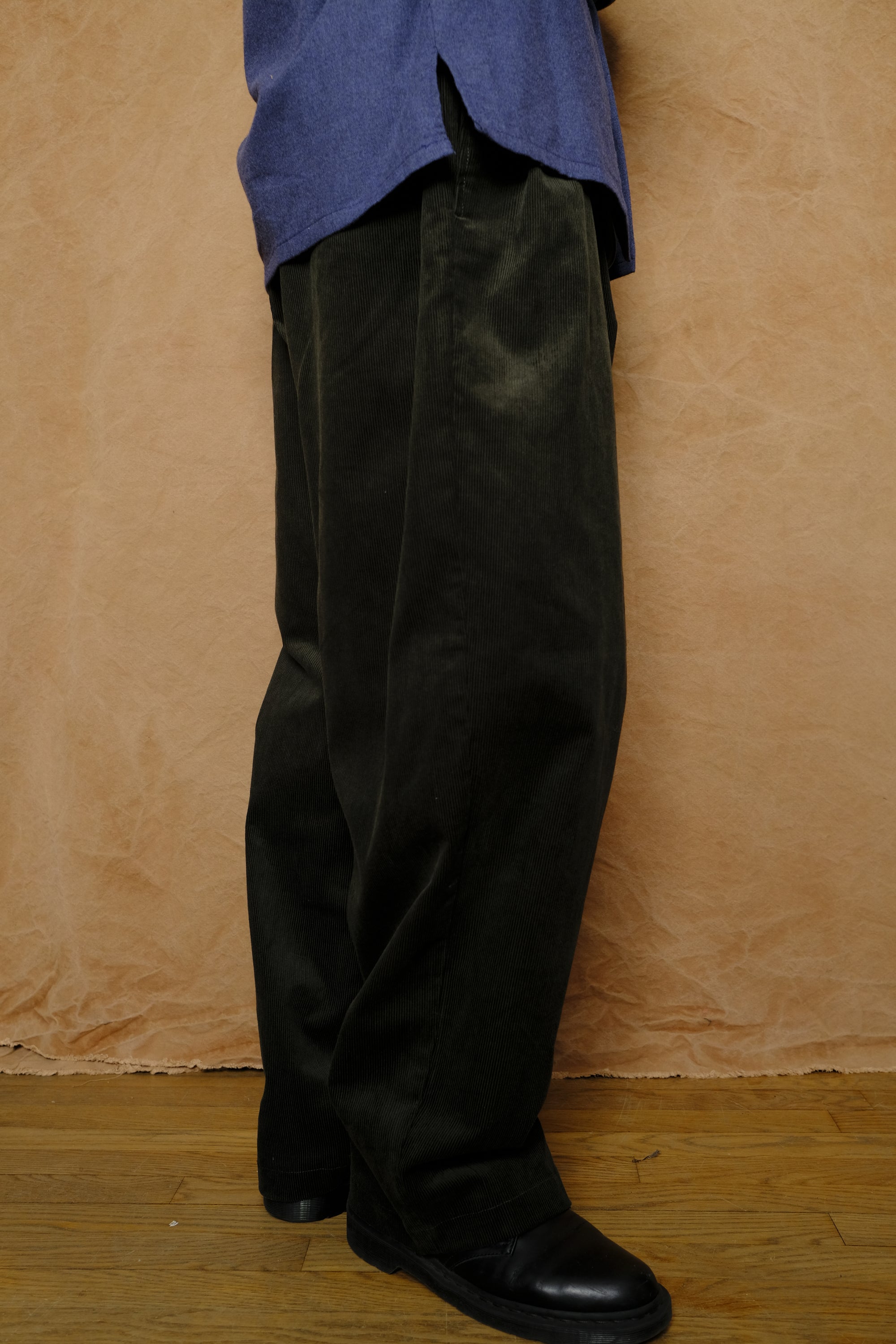 mika in green corduroy