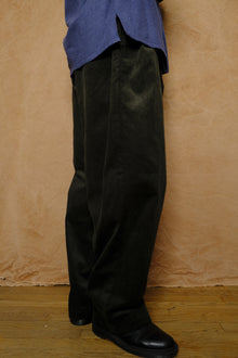 mika in green corduroy