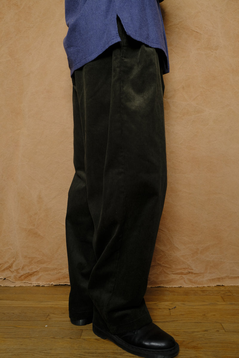 mika in green corduroy