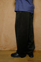 mika in green corduroy