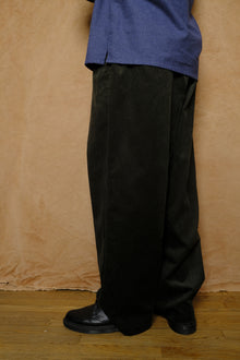 mika in green corduroy