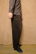 mika in brown corduroy