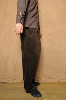 mika in brown corduroy