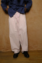 mika in pink corduroy