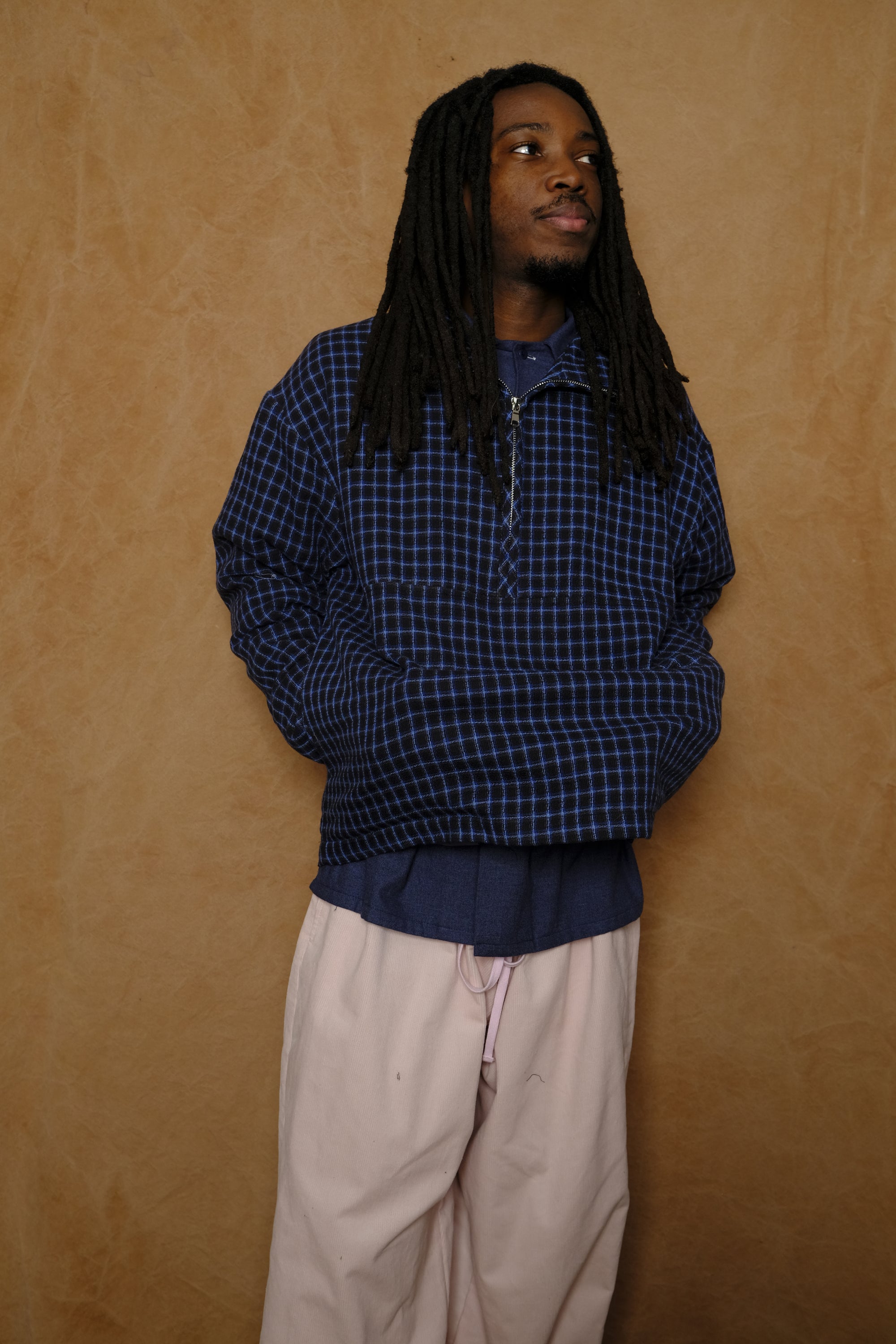 griddy half zip pullover in black / blue