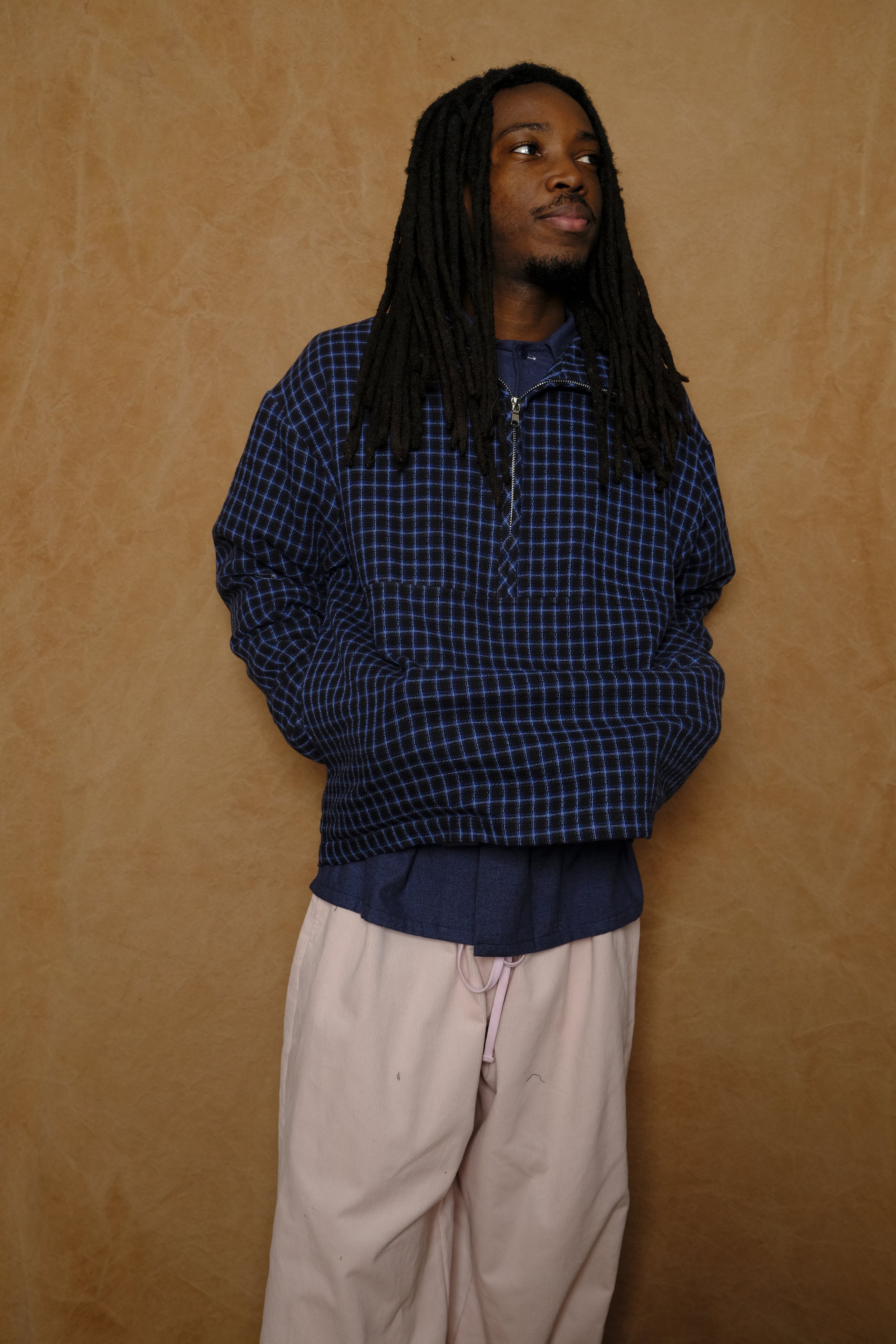 griddy half zip pullover in black / blue