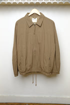 grounds jacket in olive